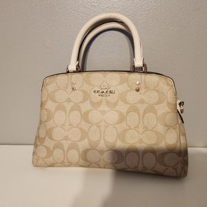 Coach hand bag with strap